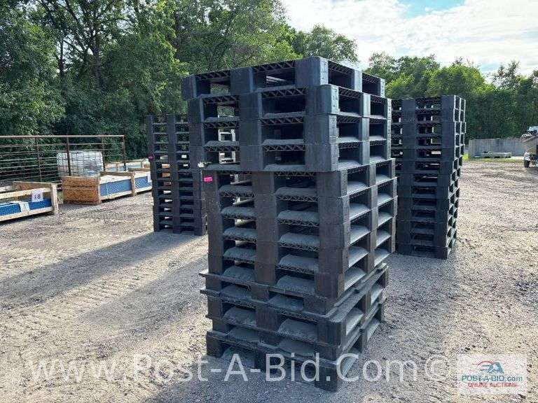 13-Black Plastic Pallets.