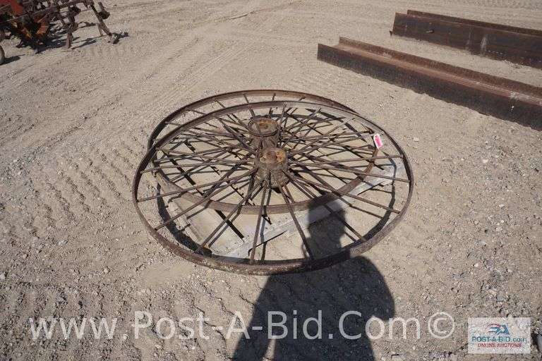 2-Dump Rake Wheels, Approx. 53" Diameter.