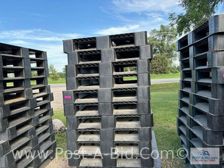 13-Black Plastic Pallets.