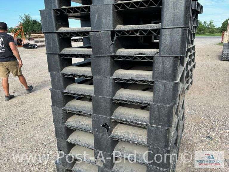 13-Black Plastic Pallets.