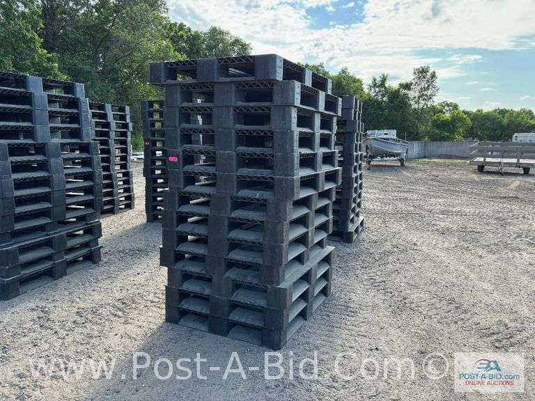 13-Black Plastic Pallets.