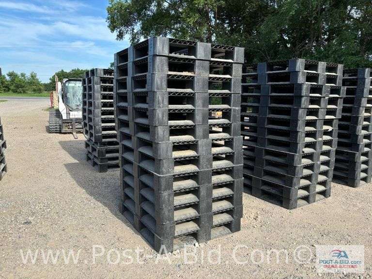 13-Black Plastic Pallets.