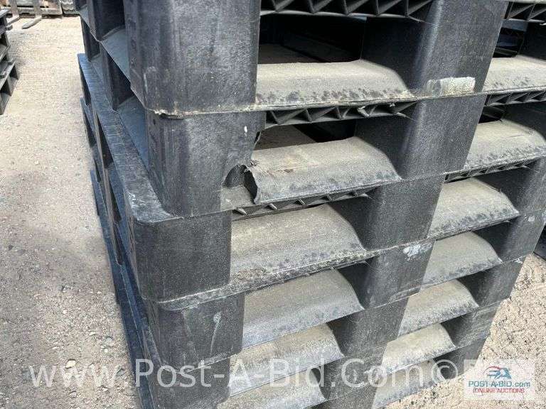 13-Black Plastic Pallets.