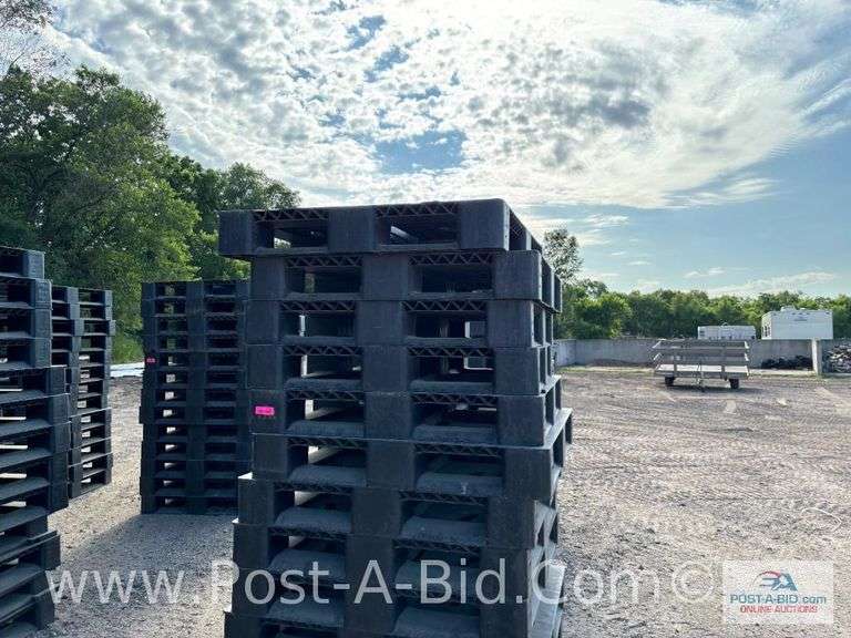 13-Black Plastic Pallets.