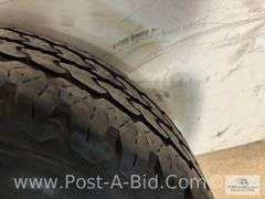 Firestone Used Tire LT 245/75/R17 On 8 Bolt Rim.
