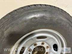 Firestone Used Tire LT 245/75/R17 On 8 Bolt Rim.