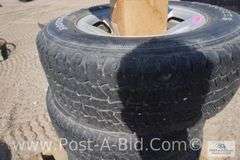 4-Firestone 245/65 R17 Tires, With Center Caps And Lugs, Owner Stated, "Wer