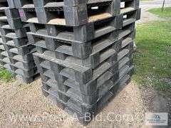 13-Black Plastic Pallets.