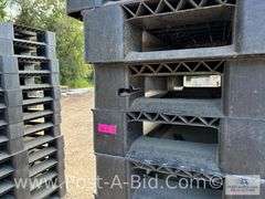 13-Black Plastic Pallets.