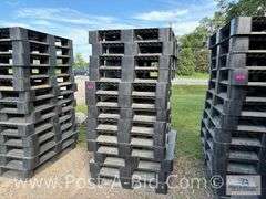 13-Black Plastic Pallets.