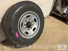 Firestone Used Tire LT 245/75/R17 On 8 Bolt Rim.