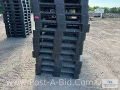 13-Black Plastic Pallets.
