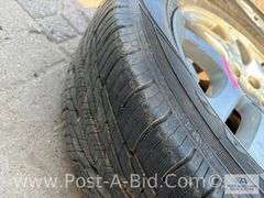 4-Goodyear Assurance Tires 225/60 R16 On Subaru Rims.