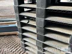 13-Black Plastic Pallets.