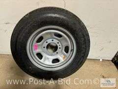 Continental Used Tire LT 275/65 R18 On 8 Bolt Rim.