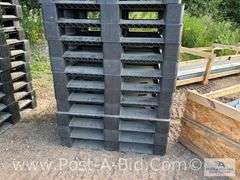 13-Black Plastic Pallets.