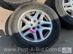 4-Goodyear Assurance Tires 225/60 R16 On Subaru Rims.