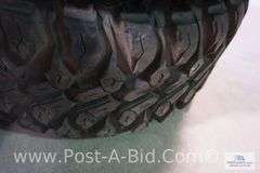 4- Side By Side Tires: 2 Front Tires Are- 27 x 9 x 12 And 2 Rear Tires Are-