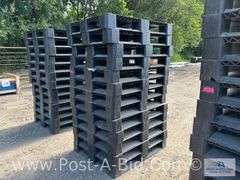 13-Black Plastic Pallets.