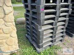 13-Black Plastic Pallets.