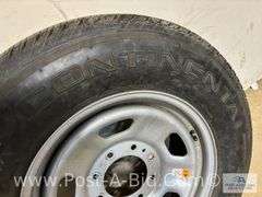 Continental Used Tire LT 275/65 R18 On 8 Bolt Rim.
