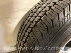 Continental Used Tire LT 275/65 R18 On 8 Bolt Rim.