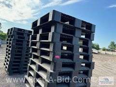 13-Black Plastic Pallets.