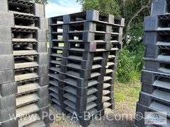 13-Black Plastic Pallets.