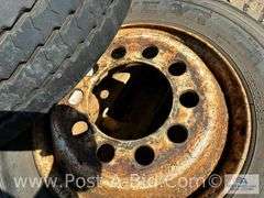 1-Hankook 215/75 R17.5 Tire and 1-Goodyear 215/75 R17.5 Tire On Steel Rim.
