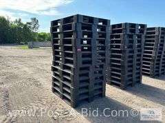 13-Black Plastic Pallets.