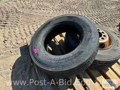 1-Hankook 215/75 R17.5 Tire and 1-Goodyear 215/75 R17.5 Tire On Steel Rim.