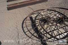2-Dump Rake Wheels, Approx. 53" Diameter.