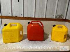 2-5 Gallon Diesel Cans And 1-6 Gallon Gas/Can.