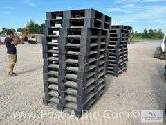 13-Black Plastic Pallets.