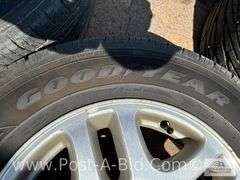 4-Goodyear Assurance Tires 225/60 R16 On Subaru Rims.