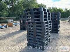 13-Black Plastic Pallets.