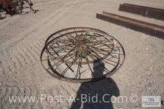 2-Dump Rake Wheels, Approx. 53" Diameter.
