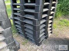13-Black Plastic Pallets.