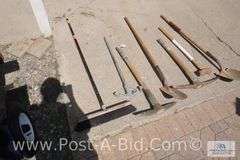 Shovel, Sledgehammer, Conduit Bender, Broom, 2-Pick Axe.