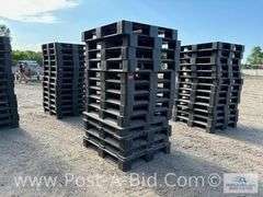 13-Black Plastic Pallets.