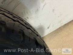 Firestone Used Tire LT 245/75/R17 On 8 Bolt Rim.