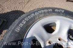 4-Firestone 245/65 R17 Tires, With Center Caps And Lugs, Owner Stated, "Wer