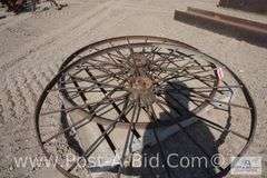 2-Dump Rake Wheels, Approx. 53" Diameter.
