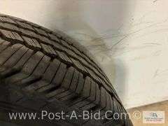 Continental Used Tire LT 275/65 R18 On 8 Bolt Rim.