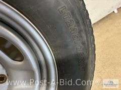 Firestone Used Tire LT 245/75/R17 On 8 Bolt Rim.