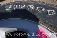 4-Firestone 245/65 R17 Tires, With Center Caps And Lugs, Owner Stated, "Wer