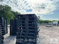 13-Black Plastic Pallets.