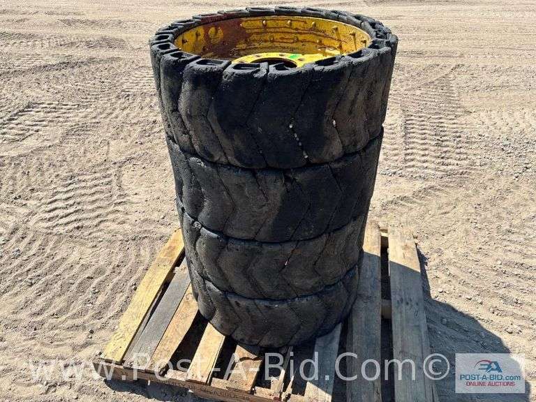 4 x Skid Steer Tires On 8 Bolt Rums, Owner Stated "12.0 U 16.5 De