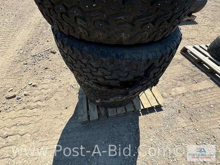 4-Firestone Radial 31 x 10.5 R15 LT Tires On 15" GM 6 Bolt Rims,