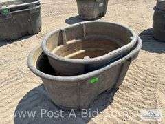 2-Rubbermaid Livestock Tanks: 100 Gallon And 70 Gallon.